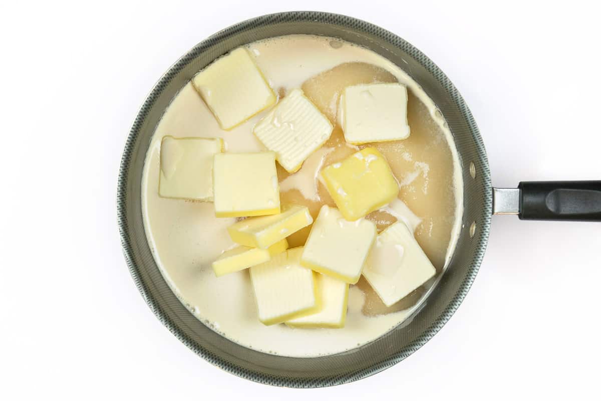Butter, sugar, and evaporated milk in a saucepan.