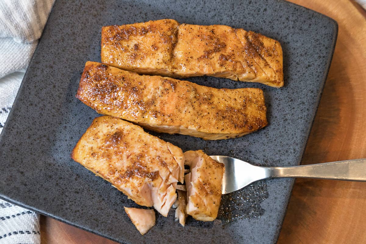 Salmon fillets on a plate.