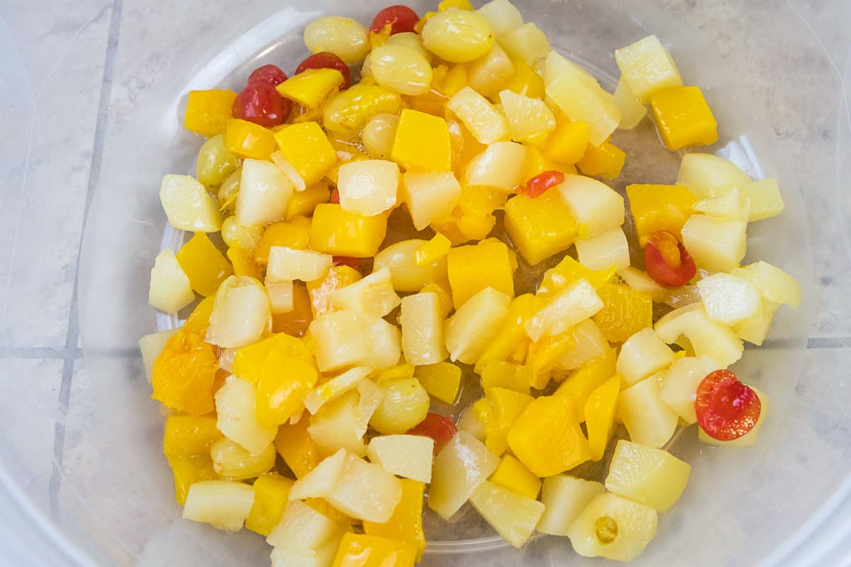 Drained fruit cocktail in a bowl.