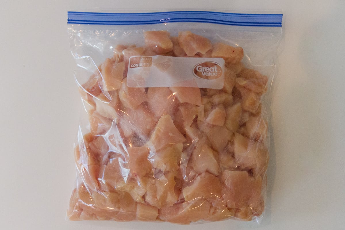 Cut up chicken in baggie.