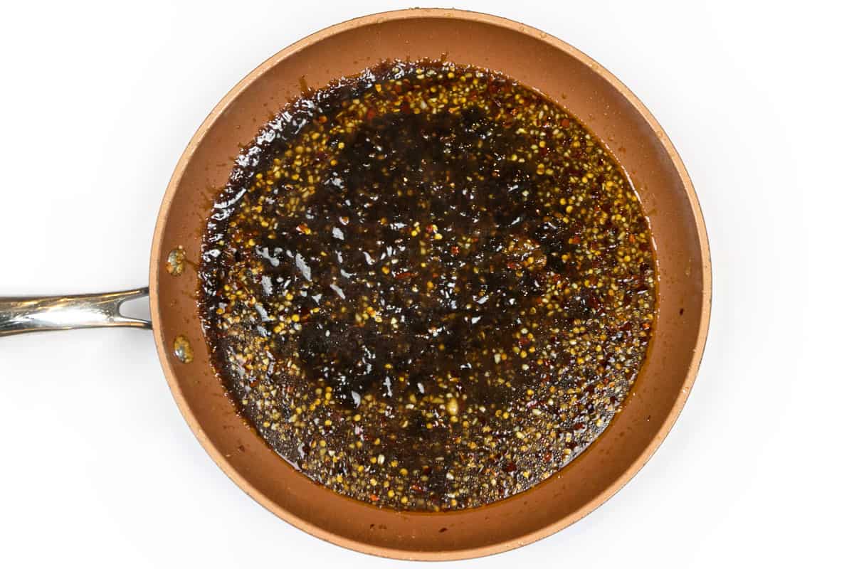 Add the sauce to the minced ginger mixture.