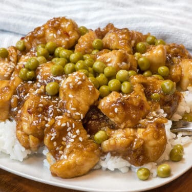 General Tso's chicken recipe on a bed of white rice.