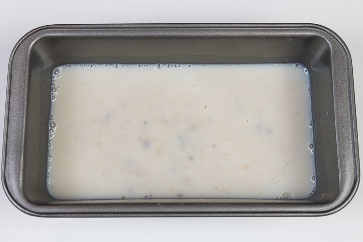 Loaf pan with milk and cream of mushroom soup.