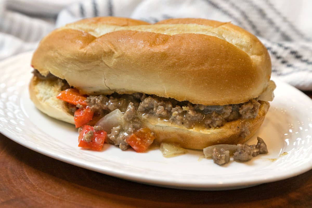 Ground beef Philly cheesesteak sandwich.