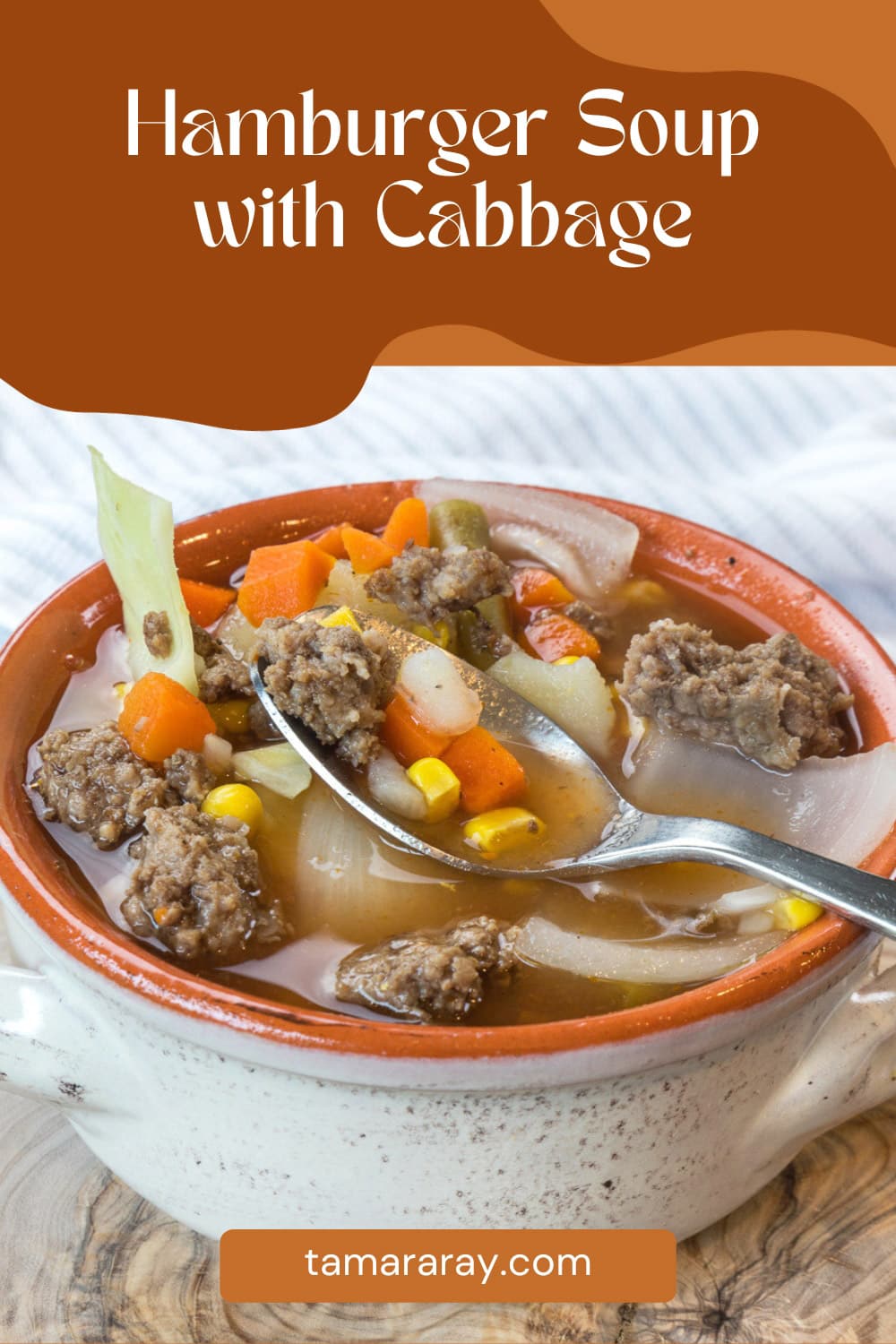 Hamburger soup with cabbage and potatoes in a bowl.