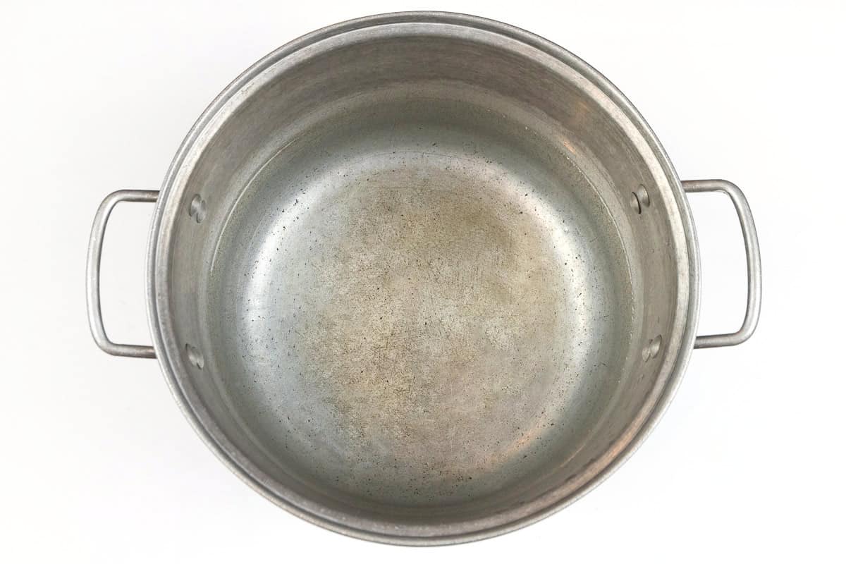 Fill a large pot with twenty cups of water.
