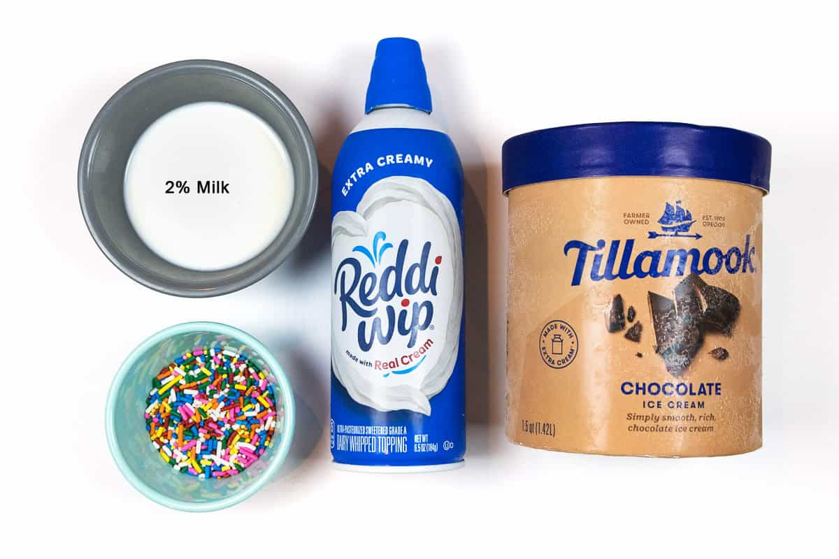 2% milk, rainbow sprinkles, whipped topping, chocolate ice cream.