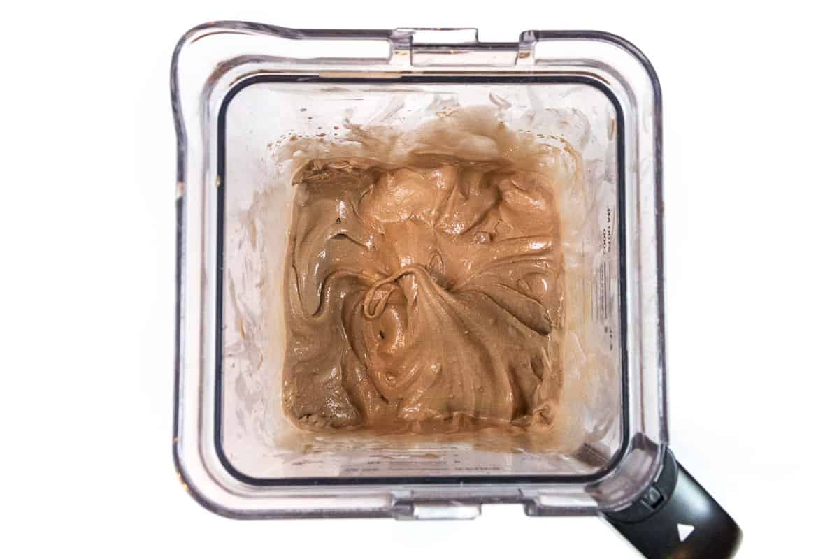 Blend the chocolate ice cream and milk to make the homemade chocolate milkshake.