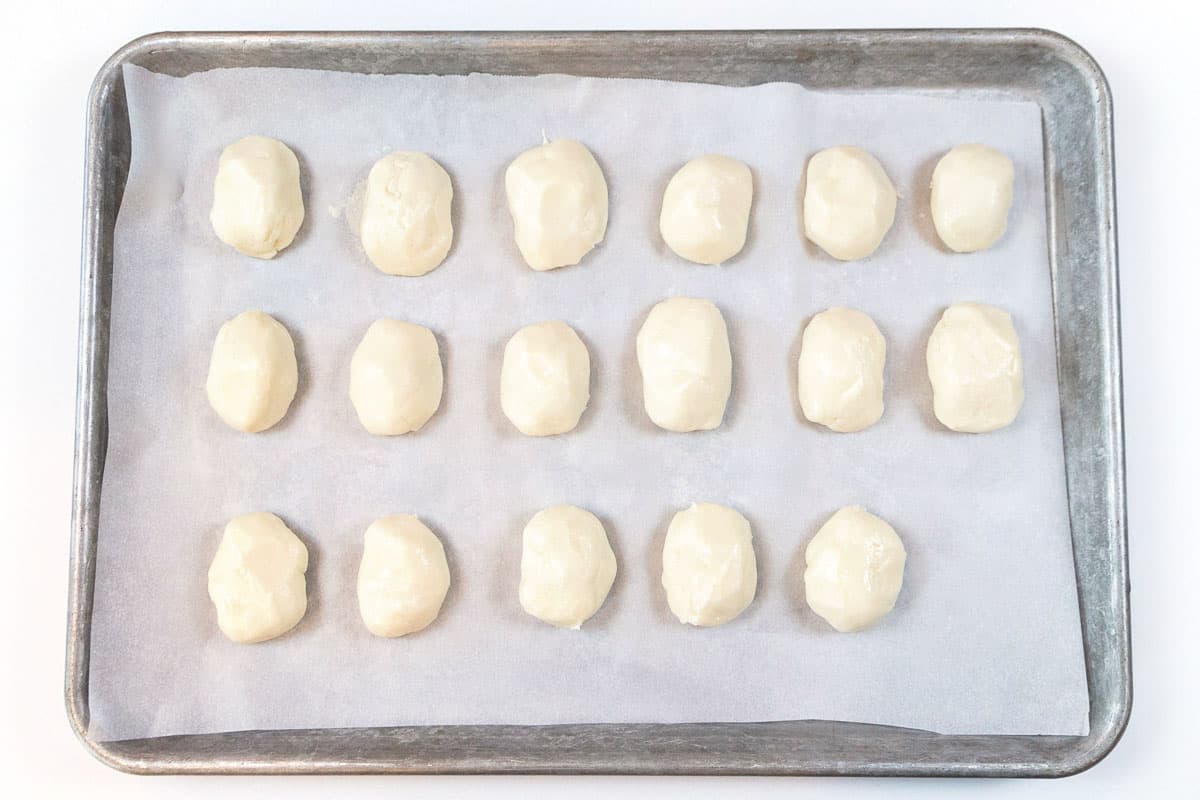 marshmallow creme shaped like Easter eggs on the parchment paper.