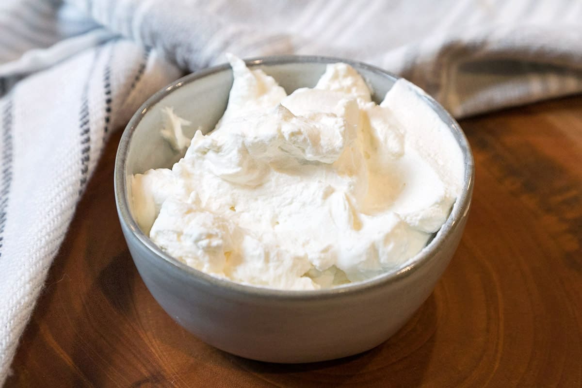 Homemade whipped cream in a bowl.
