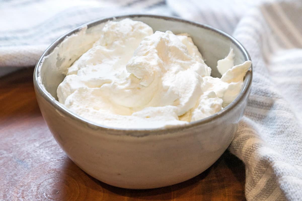 Homemade whipped cream in a bowl.
