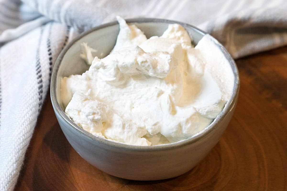 Homemade whipped cream in a bowl.