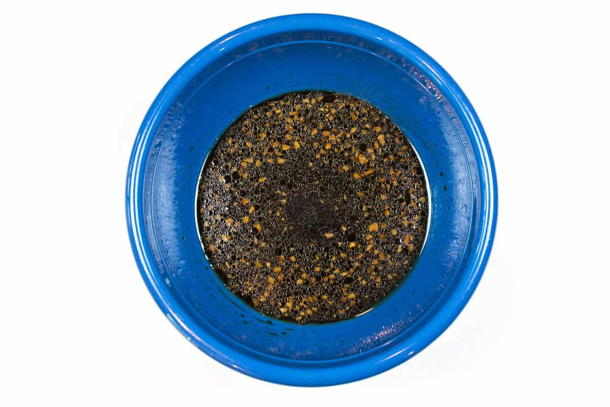 Brown sugar and soy sauce mixture in a bowl.