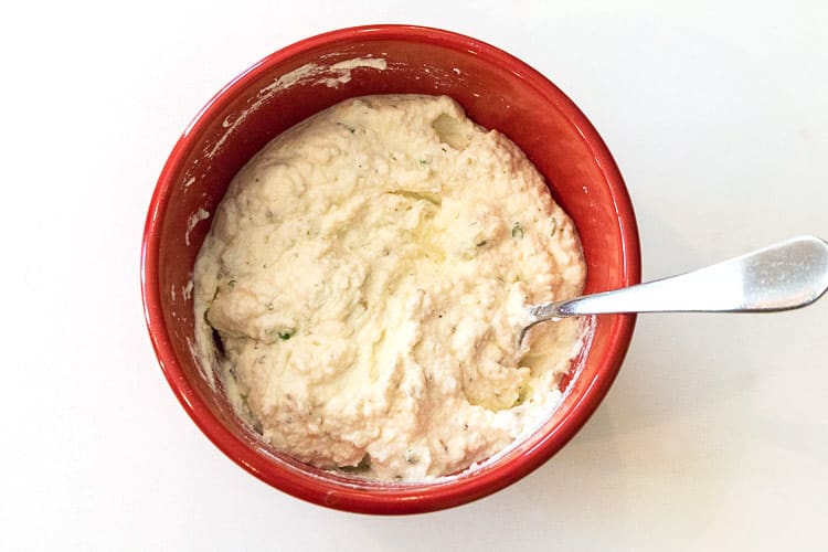 Ricotta cheese mixture in a bowl.