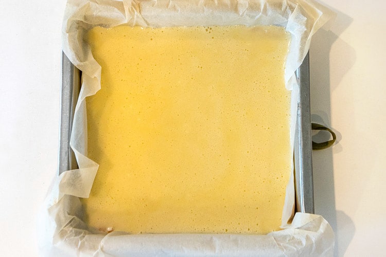 Lemon bar filling in baking pan.