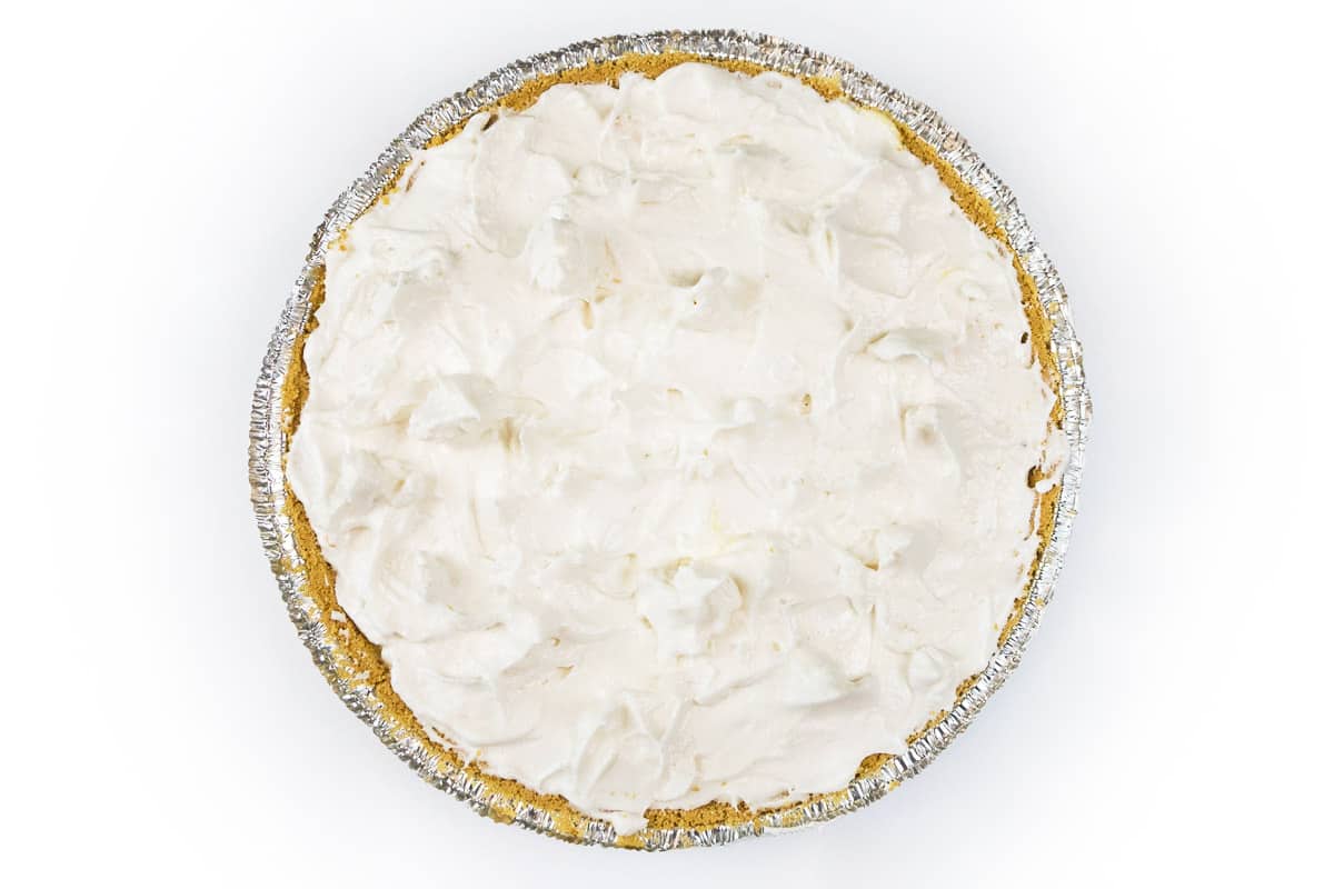 Spread the meringue over the top of the lemon filling.