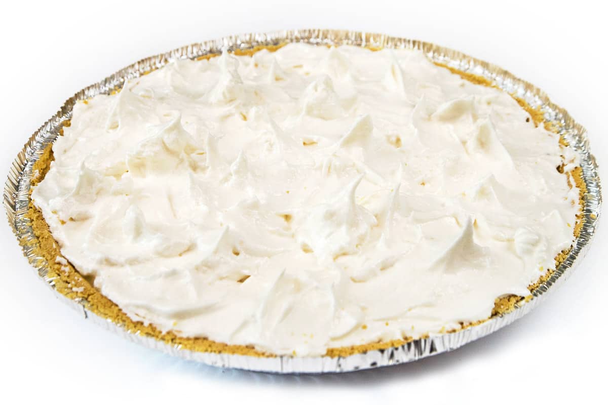 Make peaks in the meringue topping.