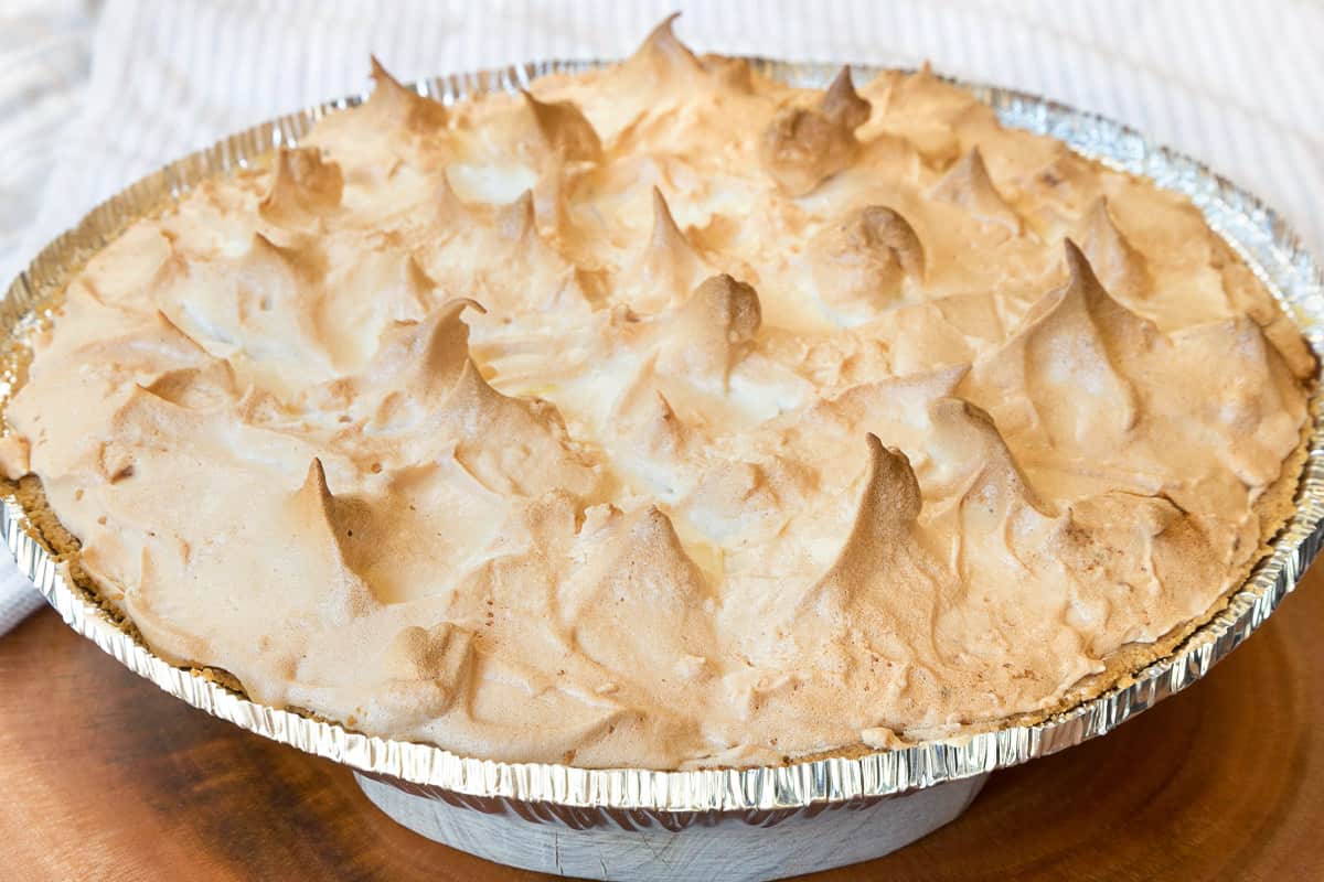 Lemon meringue pie hot out of the oven.