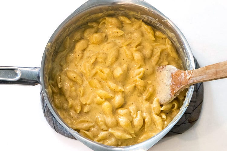 Mac and cheese cooking on the stove.