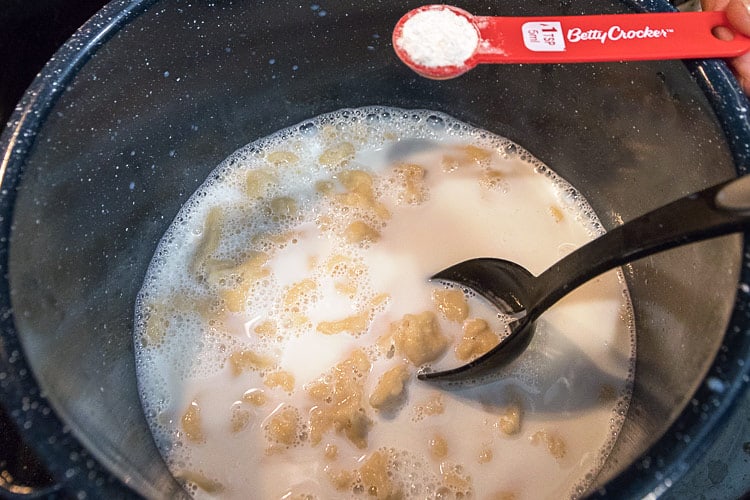 Flour is added to thicken the milk and dumplings.