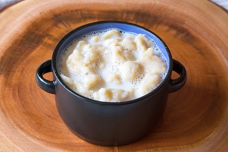 Milk soup with dumplings in a bowl.