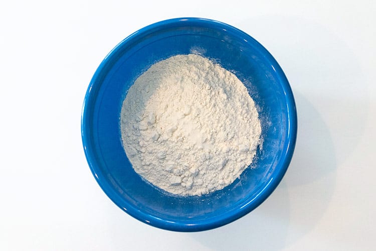 Flour and salt in a bowl for milk soup with dumplings.
