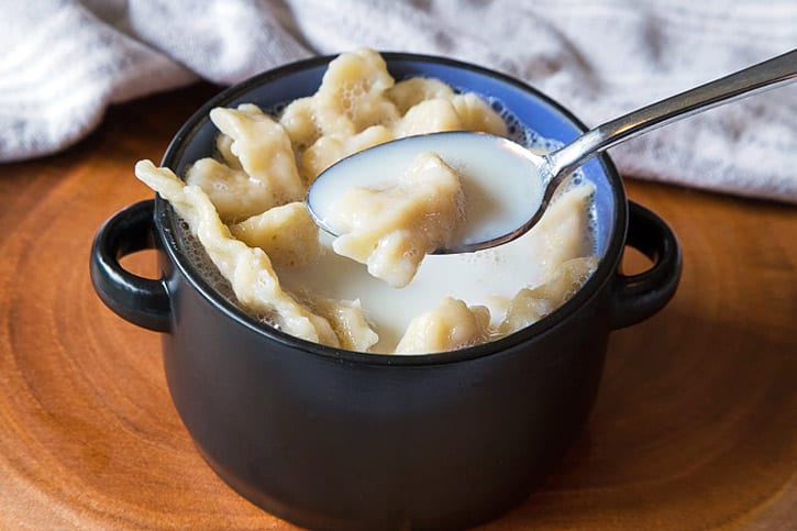 Milk soup with dumplings in a bowl.