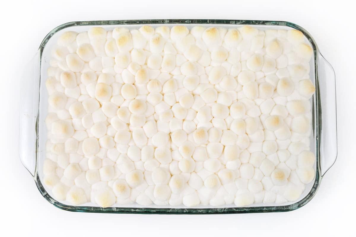 At the same temperature, bake the mini marshmallows on top of the Mississippi mud cake for five more minutes.