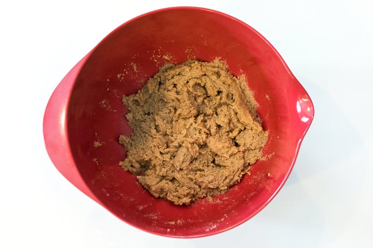Mix one and three fourths cups of dark brown sugar with three fourths cup of melted butter.