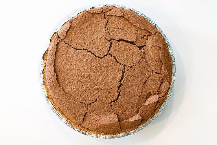 The Mississippi mud pie is baked at three hundred and twenty-five degrees Fahrenheit for forty-five minutes.