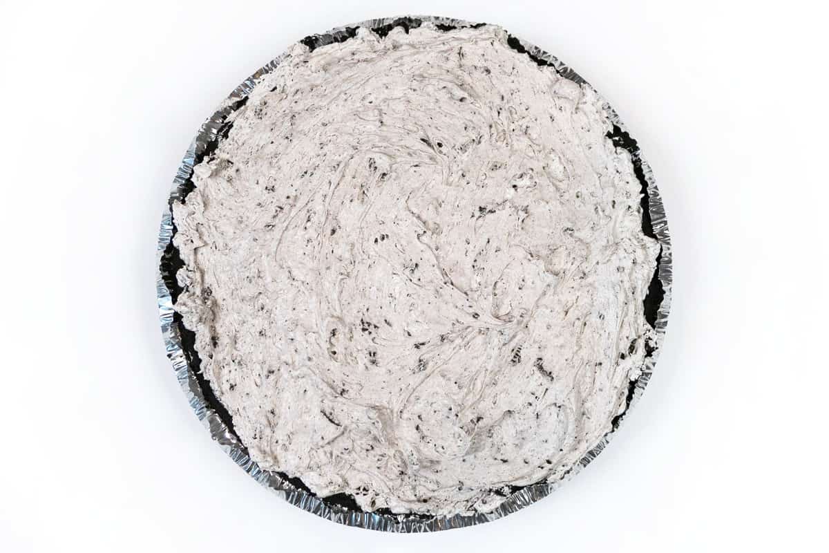 Put the Oreo filling into the Oreo pie crust.