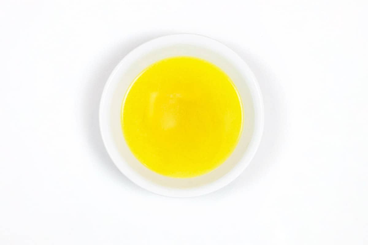 Melted butter in a dish.