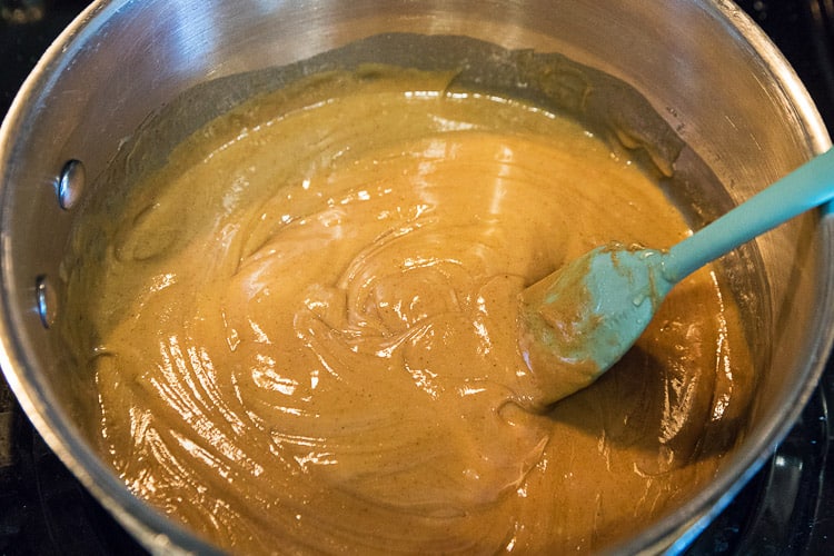 Keep stirring until the peanut butter blends in with the honey, then turn the burner off.