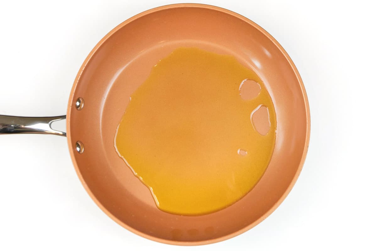 Put two tablespoons of olive oil in a frying pan.