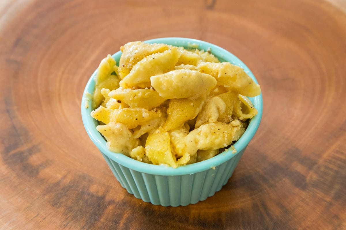 Mac and cheese in a small cup.