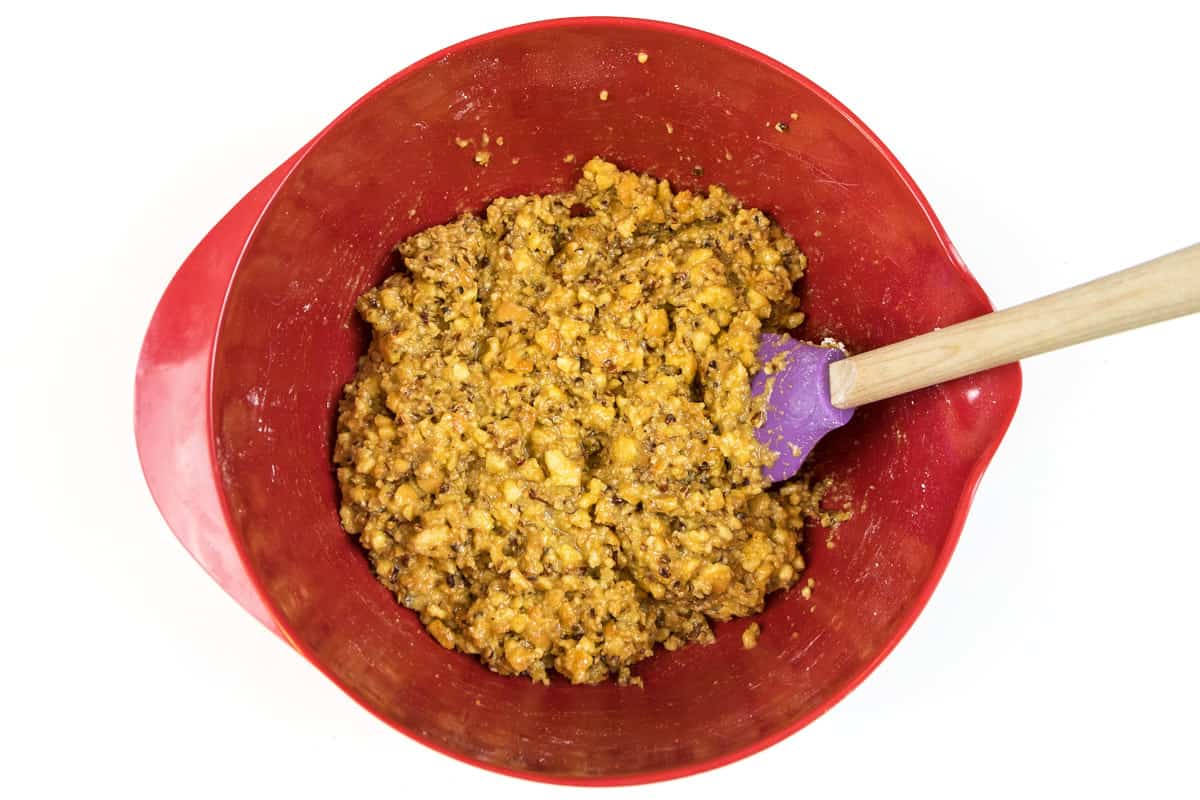 Mix the orange juice concentrate, the mixed pecans, powdered sugar, and vanilla wafers until blended and sticky.