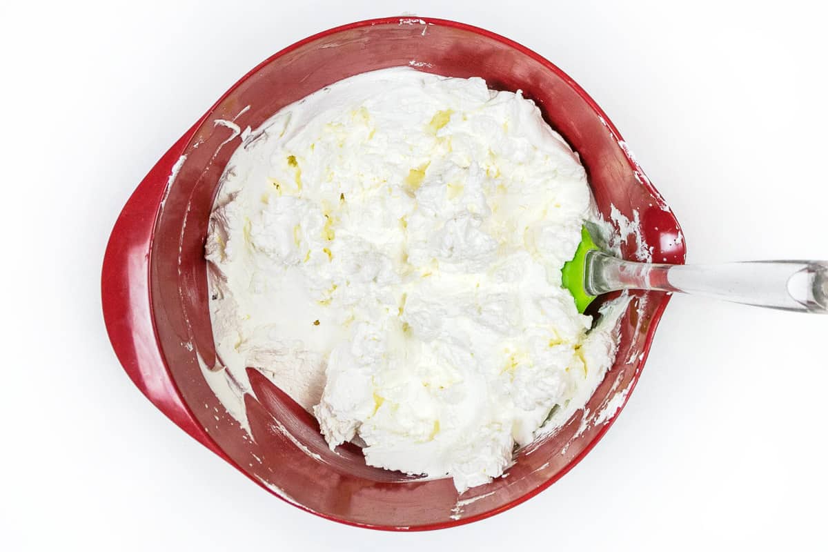 Whip the heavy cream with a hand mixer for ten minutes or so.