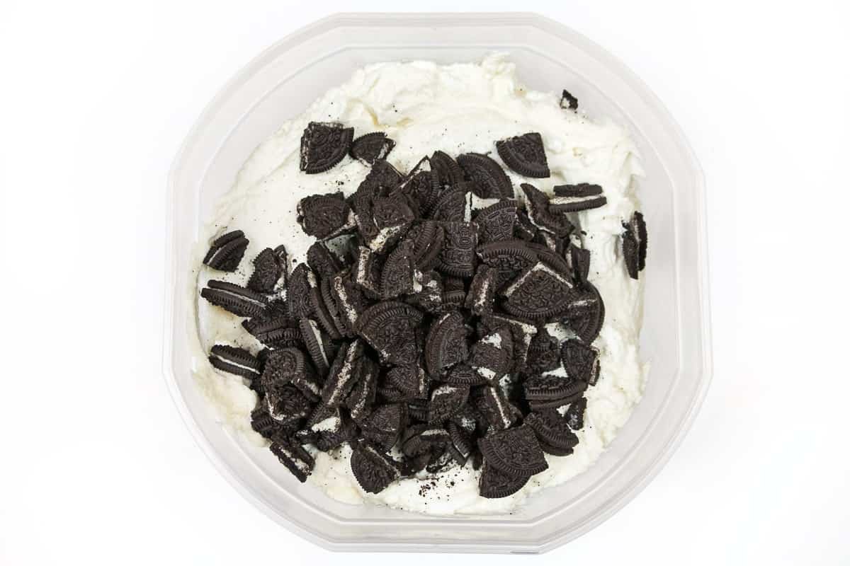 Add the Oreo cookie pieces to the semi-frozen ice cream.