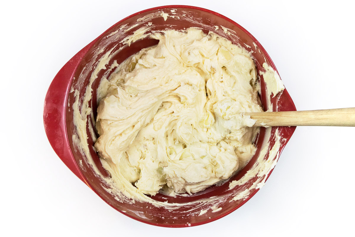 Mix the flour mixture with the eggs and the cream cheese mixture.