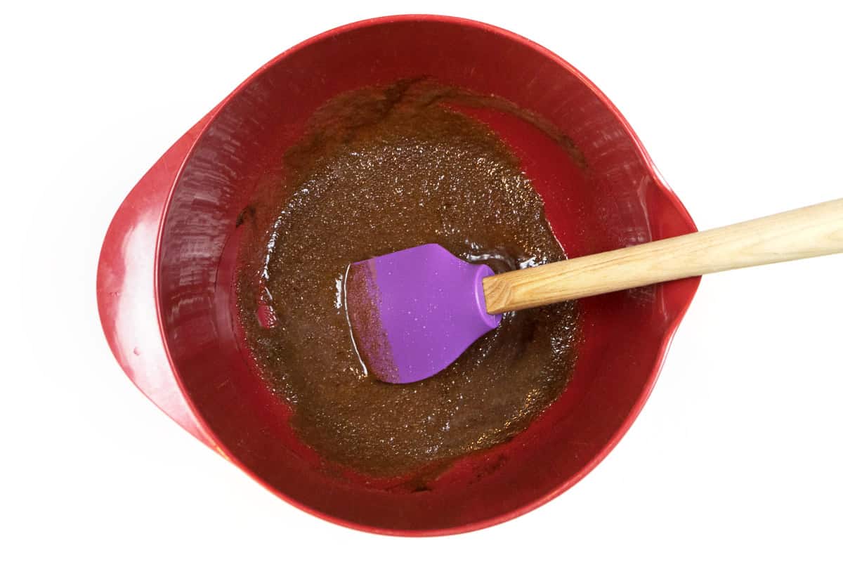 Mix the melted butter with the sugar, brown sugar, and cinnamon.