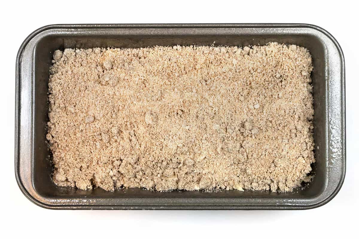 Peach bread recipe with crumble topping before baking.