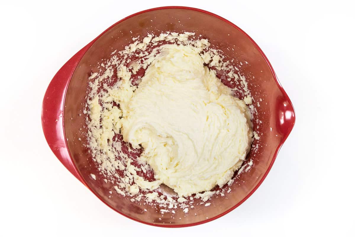 Mix the melted butter, cream cheese, and granulated sugar until fluffy