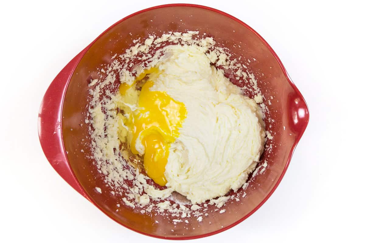 Add two eggs to the cream cheese mixture until fluffy