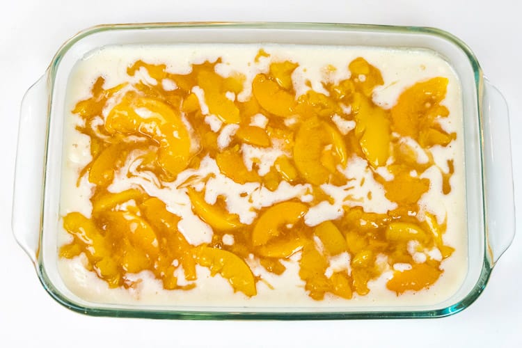 The peaches are added to the Bisquick mixture.
