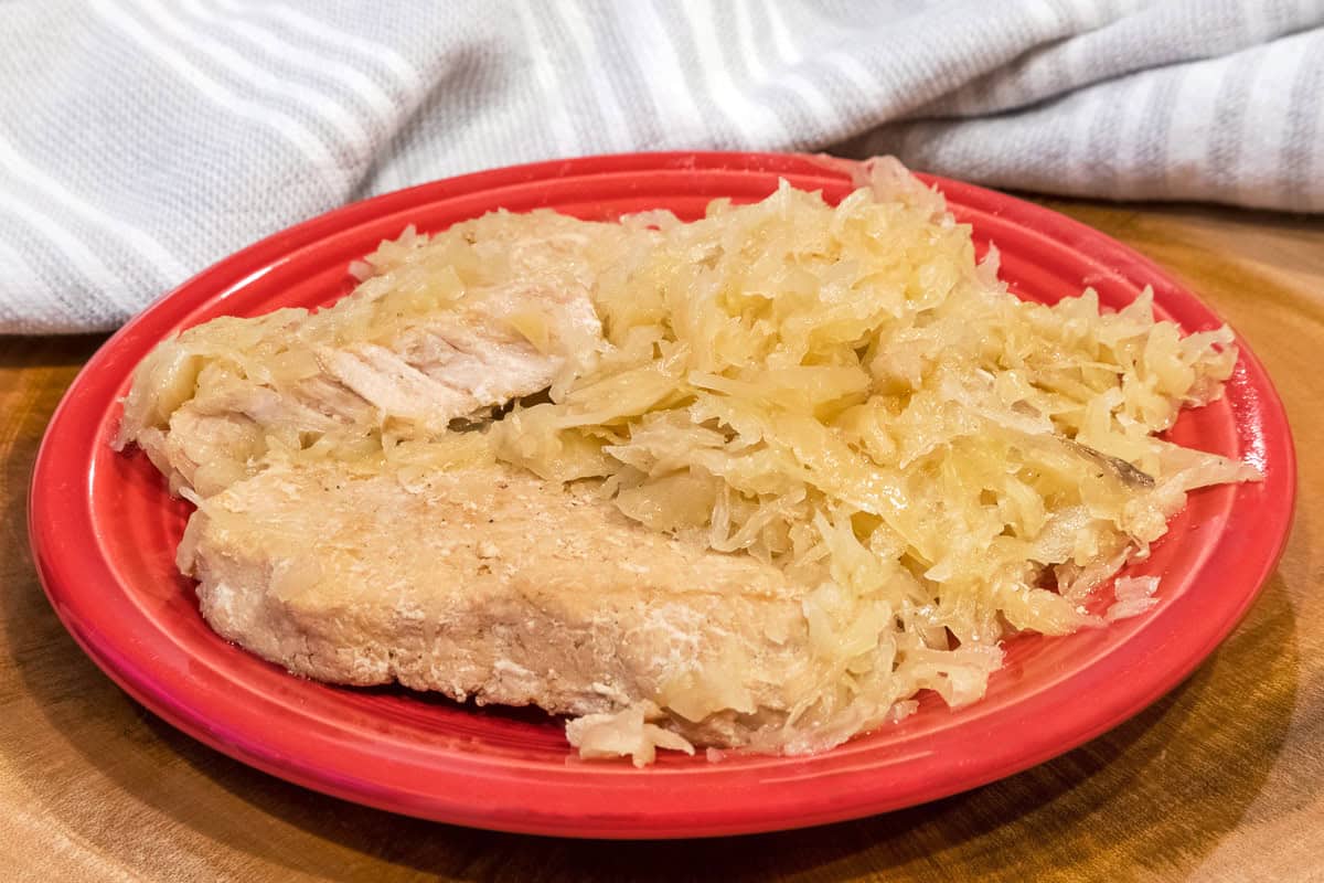 Plate of pork chops and sauerkraut.