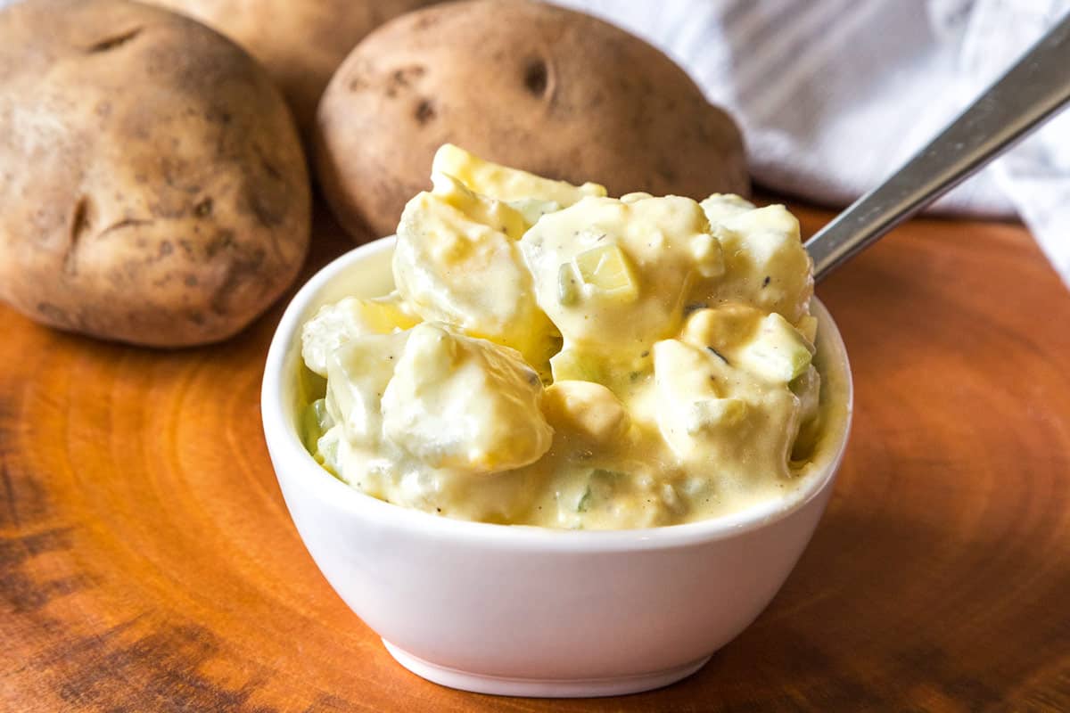 Potato Salad with Eggs and Mustard in a bowl.