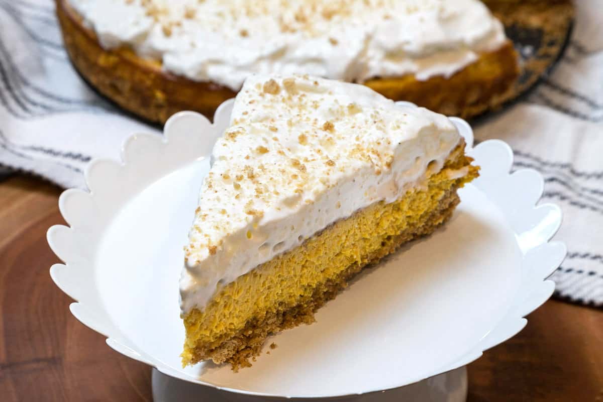Pumpkin cheesecake on a plate.