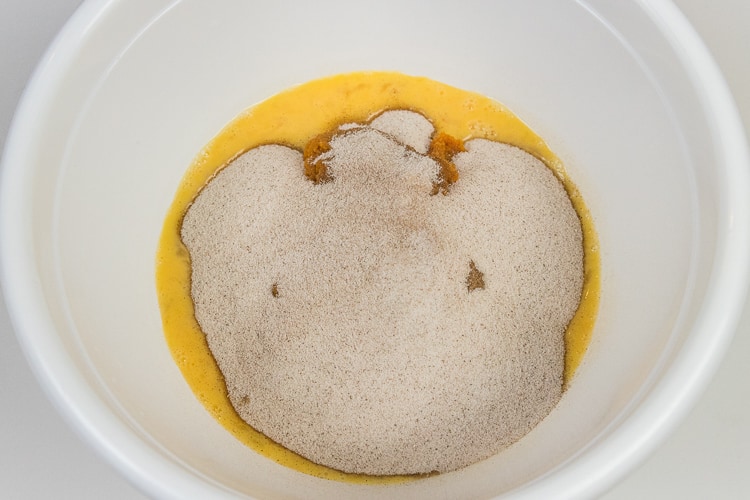 Dry spices are added to the eggs and pumpkin.