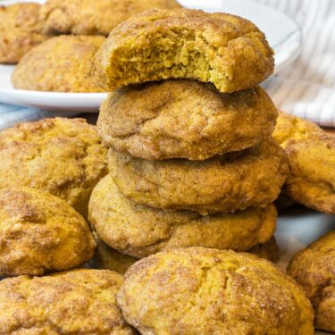 Pumpkin snickerdoodle cookies on a plate.