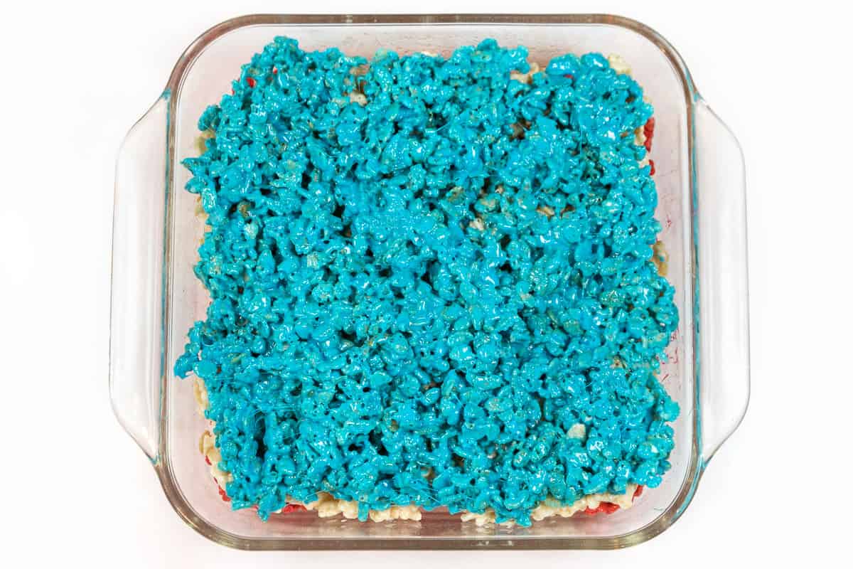 Add the blue layer on top of the red white and blue rice krispie treats